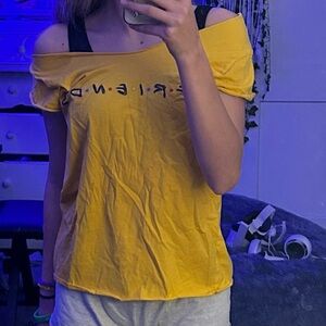 Friends thrifted off the shoulder tee